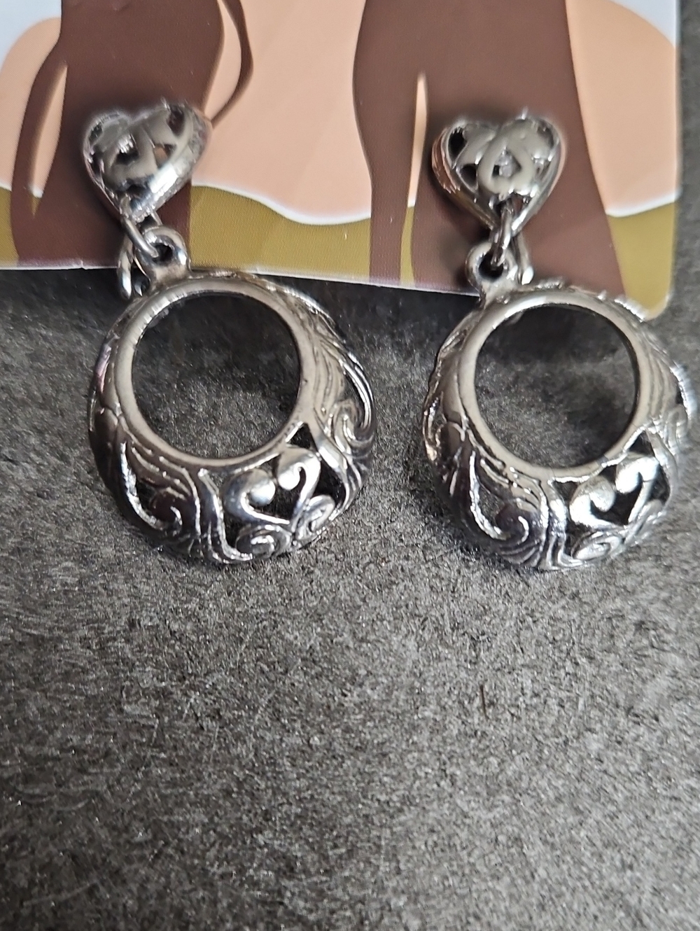 Clip On Silver Tone Earrings Heart Cut Out